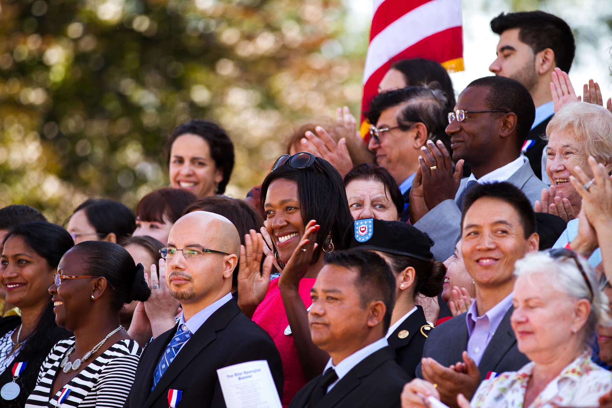 A group of people attending a naturalization ceremony. Eze Amos/IRC